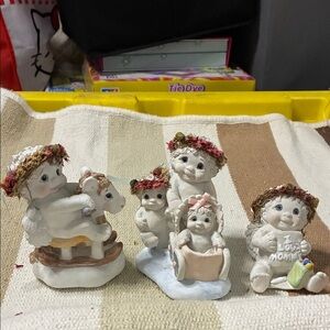 Charming Figurine Set with Red and Brown Accents